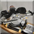 T01. Mitre saw with folding stand. 